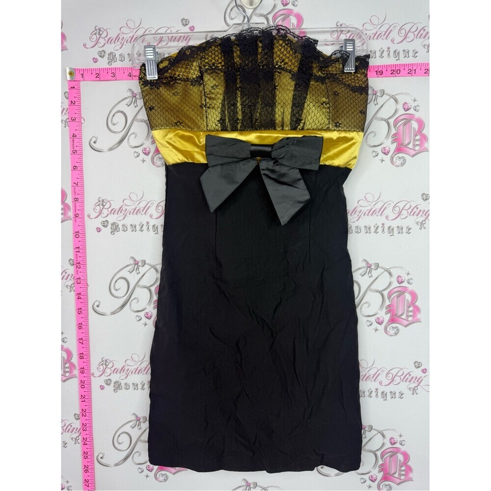 Seductions Strapless Black Dress with Gold Lace Bodice and Black Bow